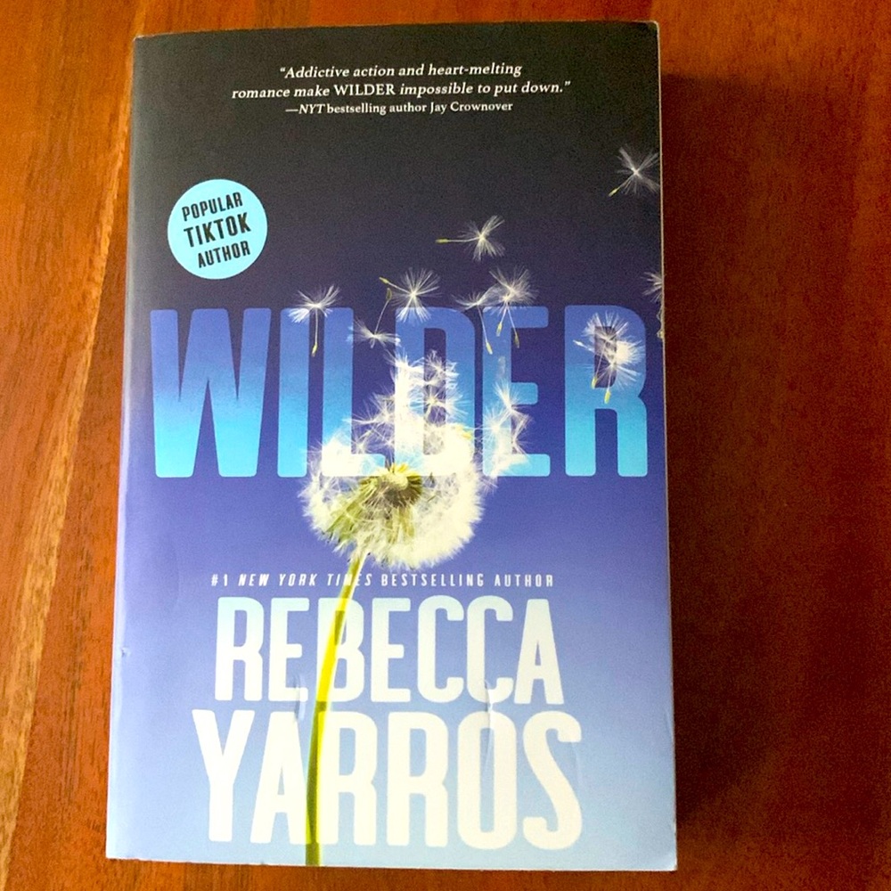 Paperback novel “Wilder” by Rebecca Yarros. Romance genre